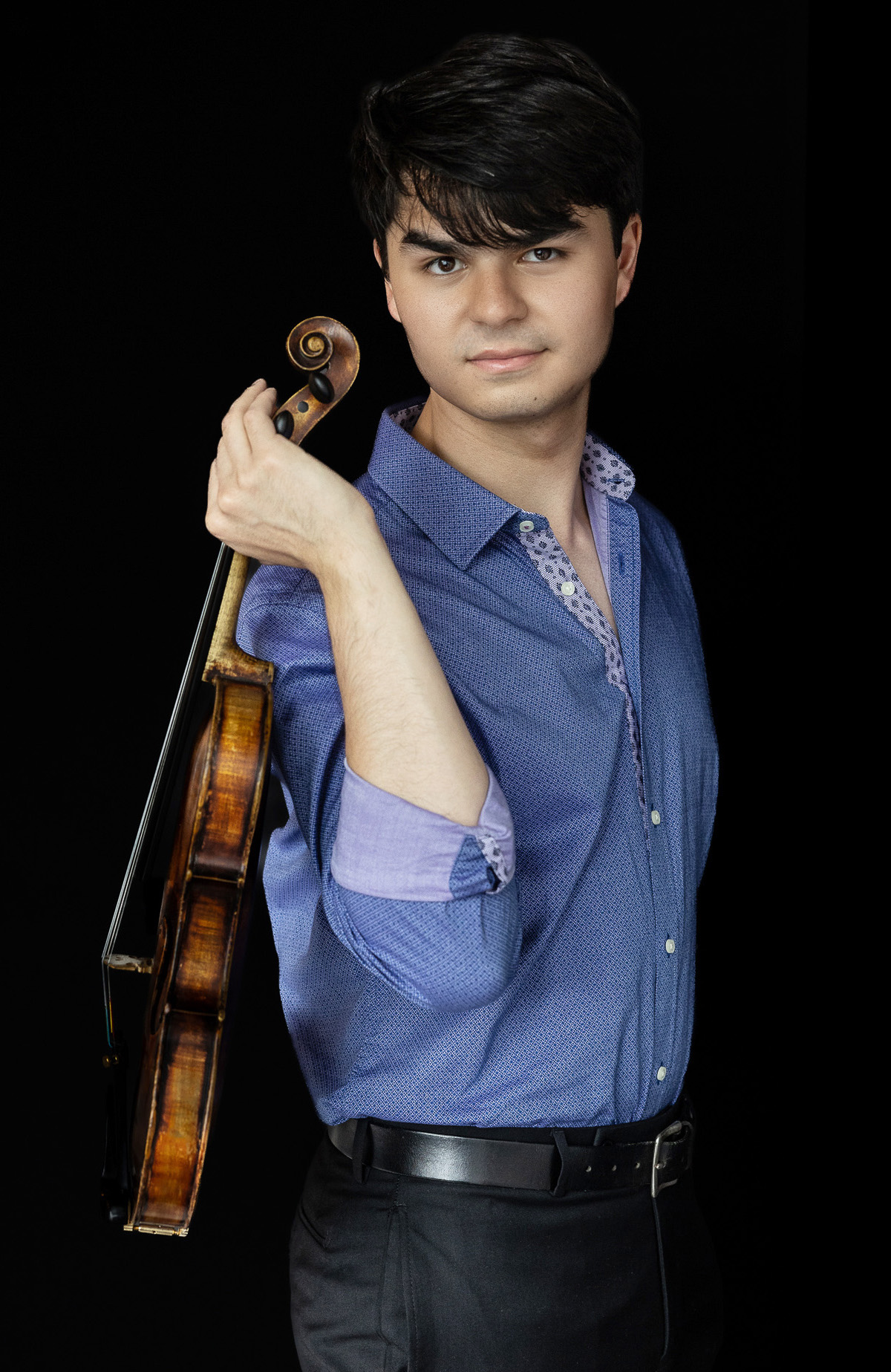 Avery Scott with violin in blue shirt